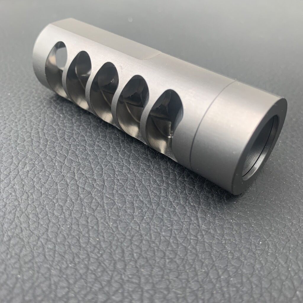 Titanium 5 port muzzle brake