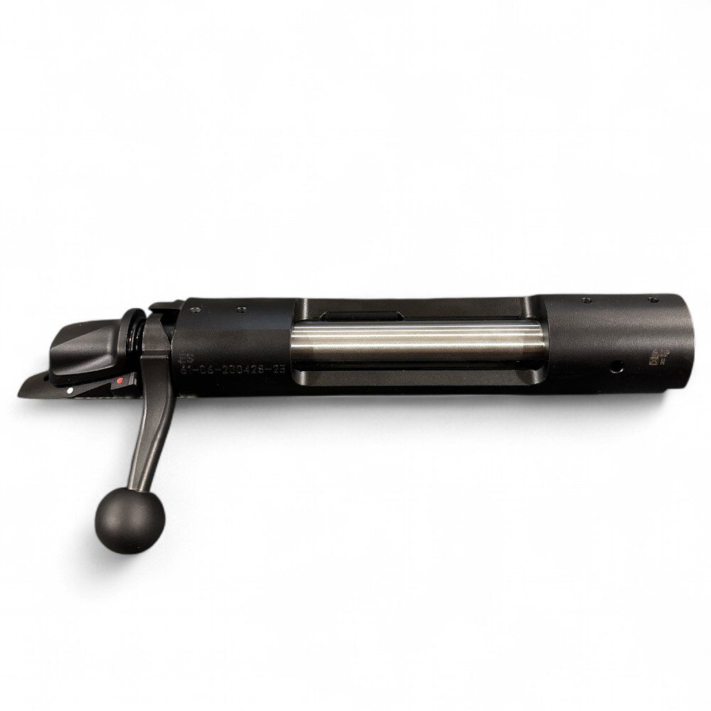 Black rifle bolt carrier group with attached charging handle.